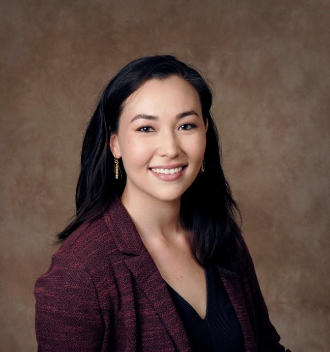 Syracuse trusts and estates attorney Catherine Ray smiles for her studio headshot. 